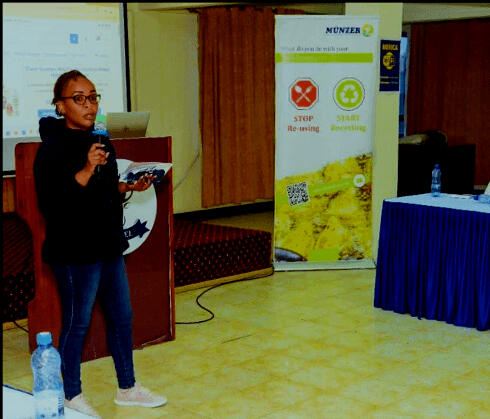 Mary speaking in a forum engaging women entrepreneurs